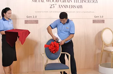 The 5,000,000 metal wood grain chair rolls off production line.
